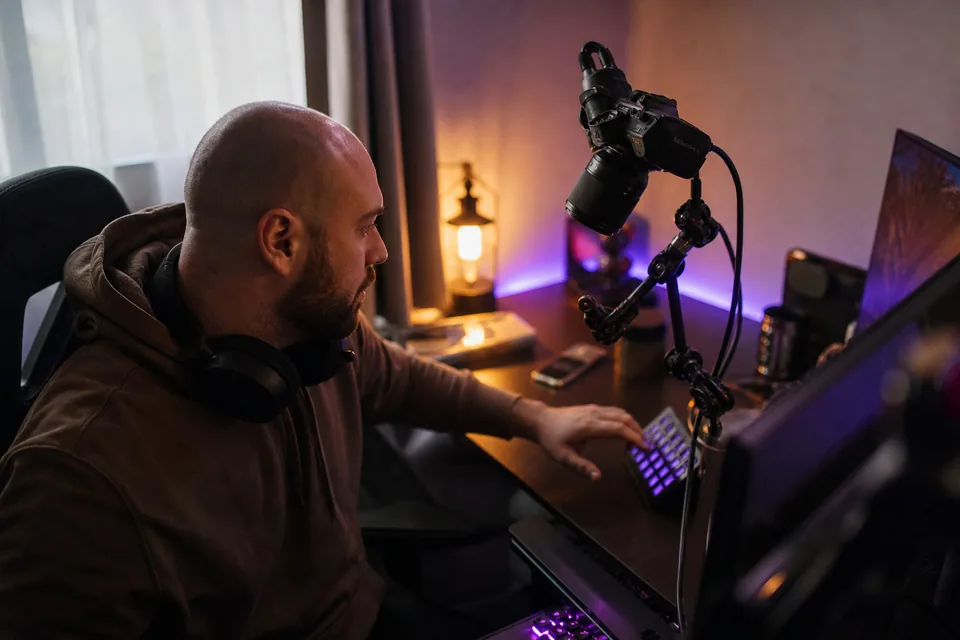 A streamer starting a live session at a desk setup